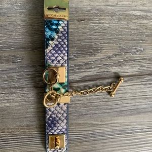 BCBG multi colored python print bracelet with gold accents